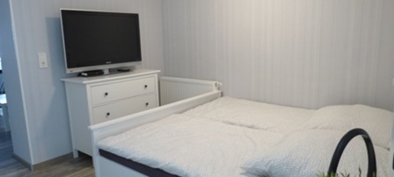 Ferienwohnung La Mia Villa in Baumholder Fernseher im Schlafzimmer Ferienwohnung La Mia Villa in Baumholder Fernseher im Schlafzimmer