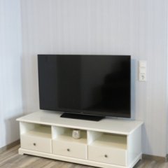 Ferienwohnung La Mia Villa in Baumholder Fernseher im Wohnzimmer Ferienwohnung La Mia Villa in Baumholder Fernseher im Wohnzimmer